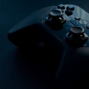 Black wireless game controller (stock photo, illustrative)
