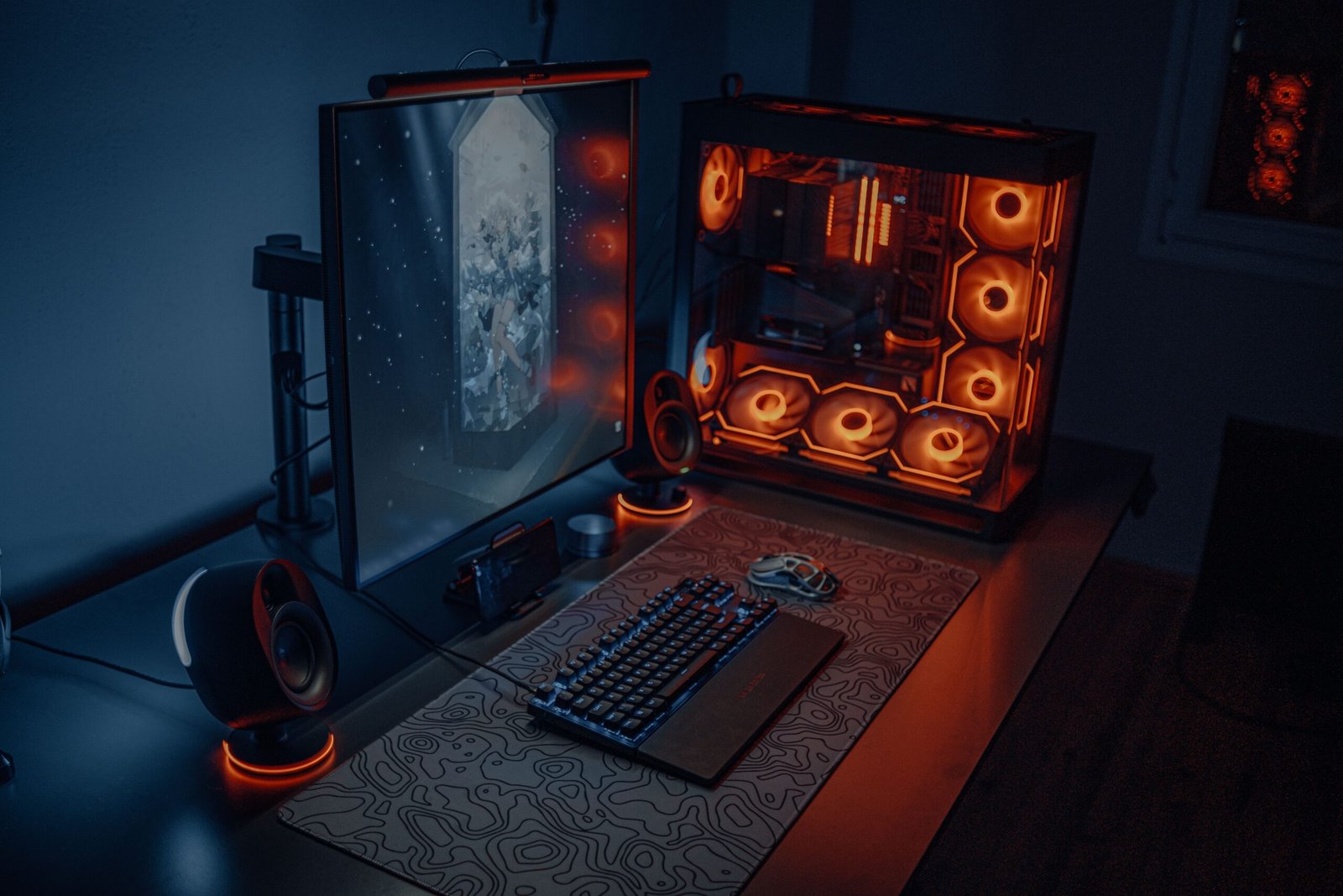 Gaming PC desk setup with RGB lighting