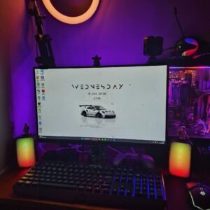 Gaming desktop PC setup with neon lighting (stock photo, illustrative)